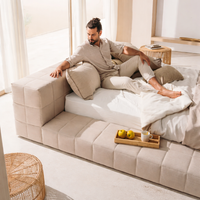 Low-profile bed in soft natural tones for a calm and contemporary bedroom