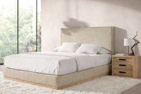 ELBA upholstered storage base with integrated plinth preventing dust accumulation and textured fabric finish