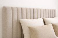 PLISSÉ upholstered headboard for Swedish boxspring beds, vertical panel design with refined Scandinavian aesthetics.